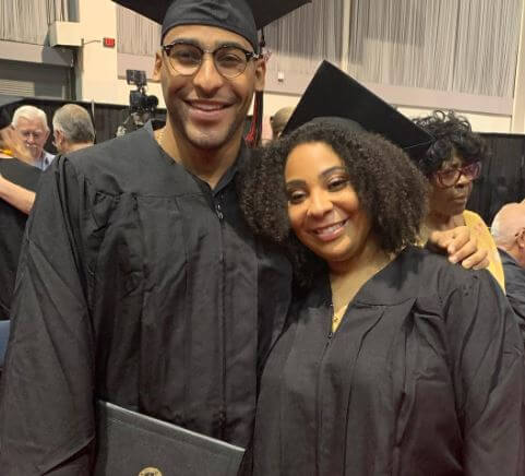 Joshua Nascimento graduating with his twin Celeste.